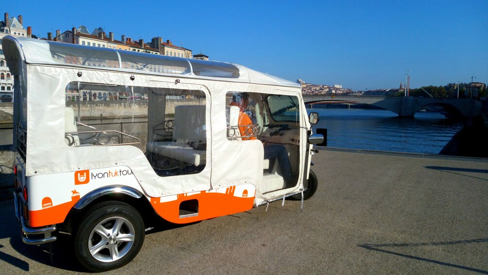 Show item 5 of 6. Tuk vehicle in Lyon