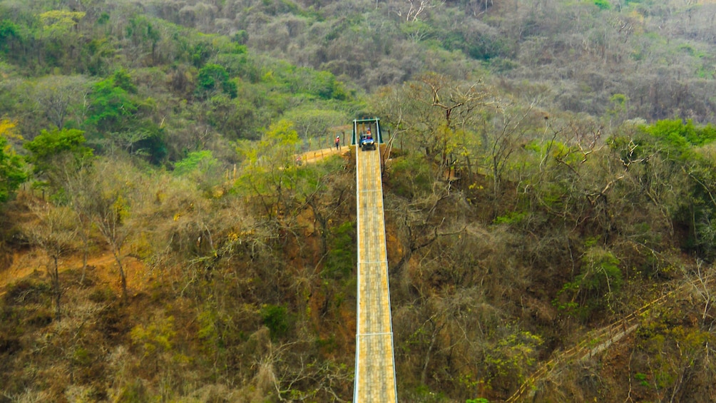 Atv crossing the Jorullo Bridge