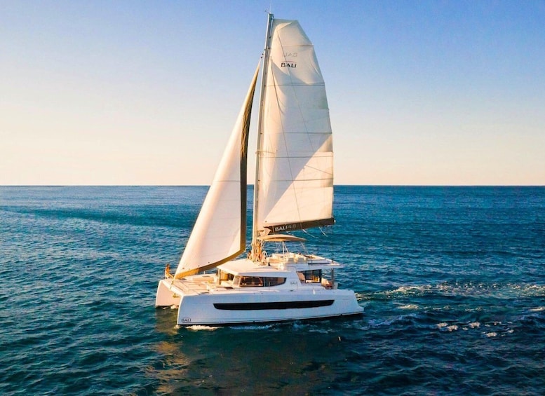Hersonissos: Sunset Private Catamaran to St George Bay