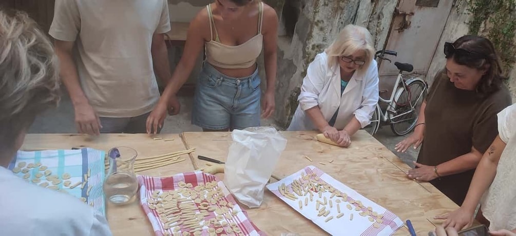 Picture 3 for Activity Lecce: Pasta Making Class in 1400s-Era Courtyard with Wine