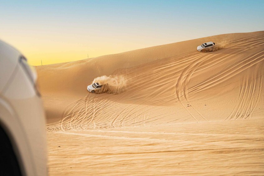 Picture 1 for Activity Abu Dhabi: Morning Dune Drive, Camel Ride & Sandboarding