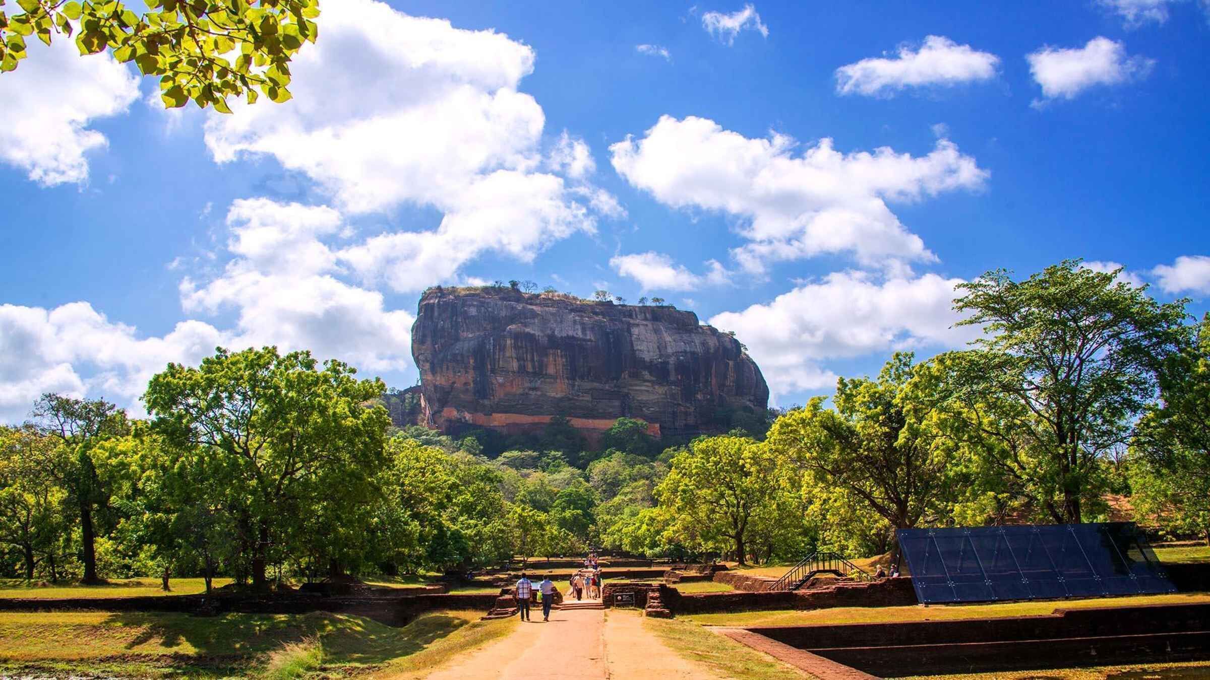 From Kandy: Sigiriya Rock & Dambulla Cave Temple by Car Tour