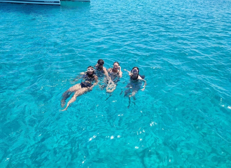 Picture 1 for Activity Mykonos: Sunset Cruise with a Buffet of Greek Delicacies