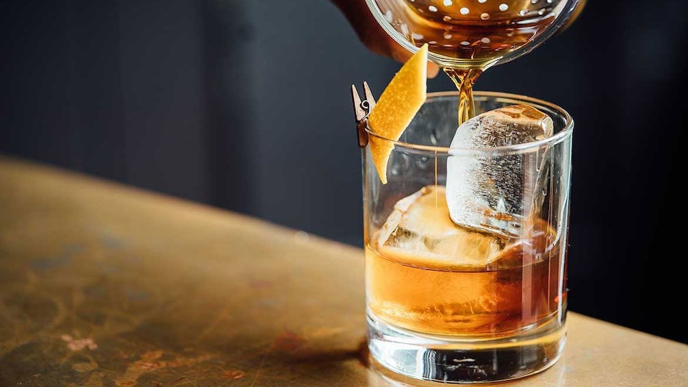 Cocktail being poured into glass in Puerto Rico