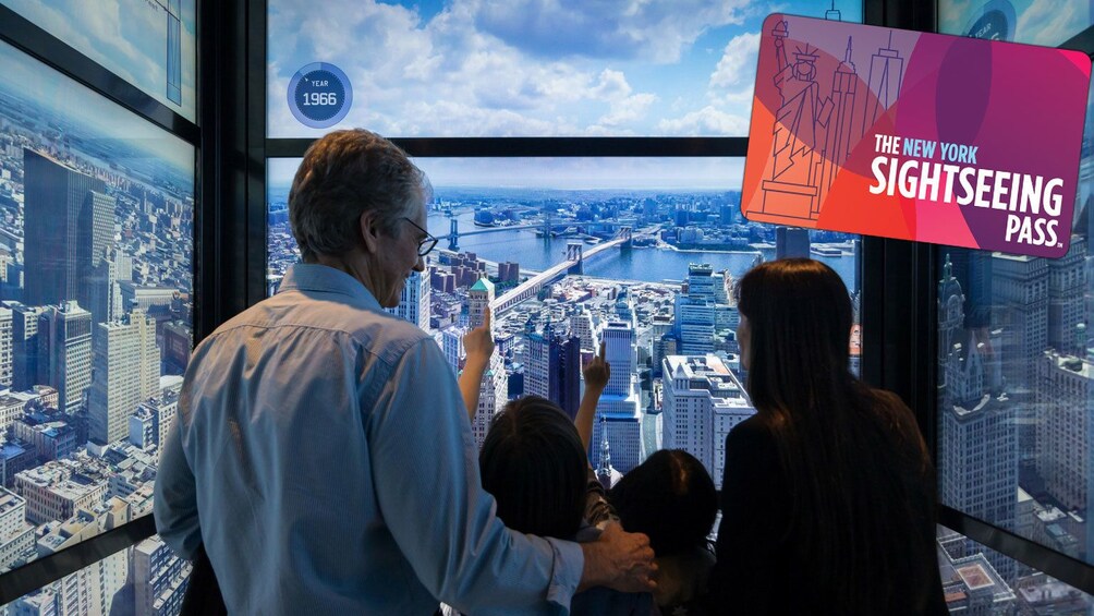 Family in an interactive elevator with a view of the city in New York