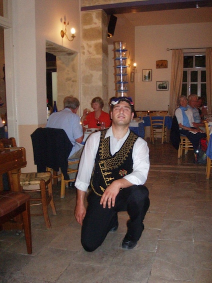 Restaurant staff member takes knee in restaurant in Cyprus