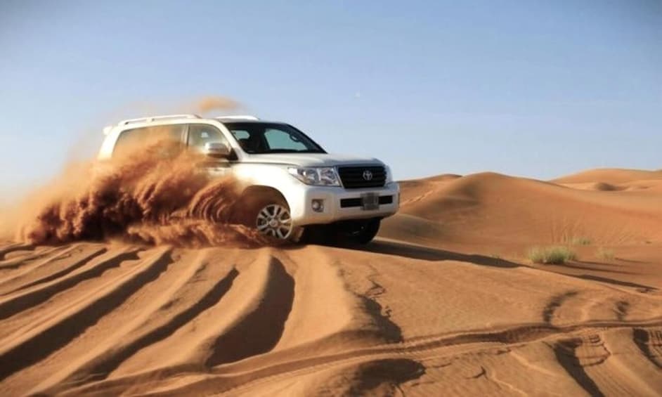 Picture 6 for Activity Doha: Desert Safari with Sandboarding, Camel Ride & Swimming