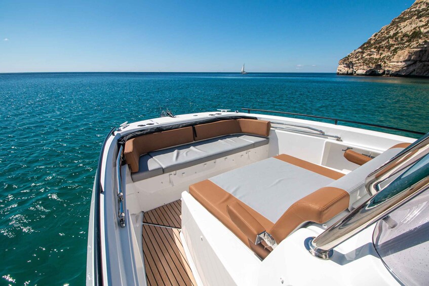 Picture 4 for Activity Cagliari: Luxury Motorboat Tour with 3 Swim Stops & Wine