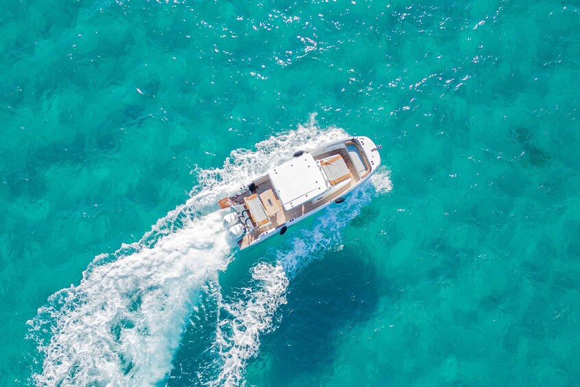 Picture 3 for Activity Cagliari: Luxury Motorboat Tour with 3 Swim Stops & Wine