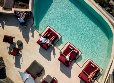 Daybed Relaxation with infinity pool use with caldera views