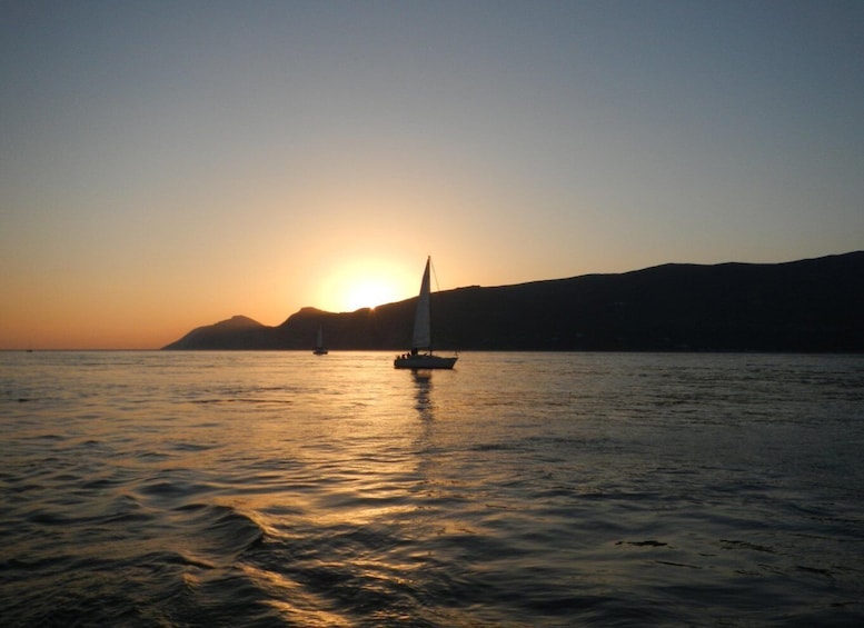 Sailing boat sunset in Setúbal