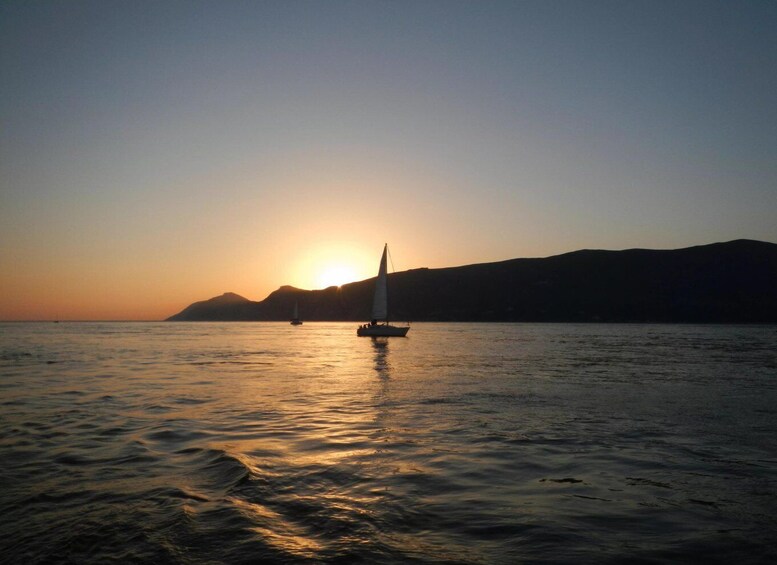 Sailing boat sunset in Setúbal