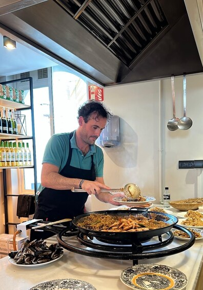 Picture 1 for Activity Seville: Paella-Cooking Experience with Sangria & Full Meal