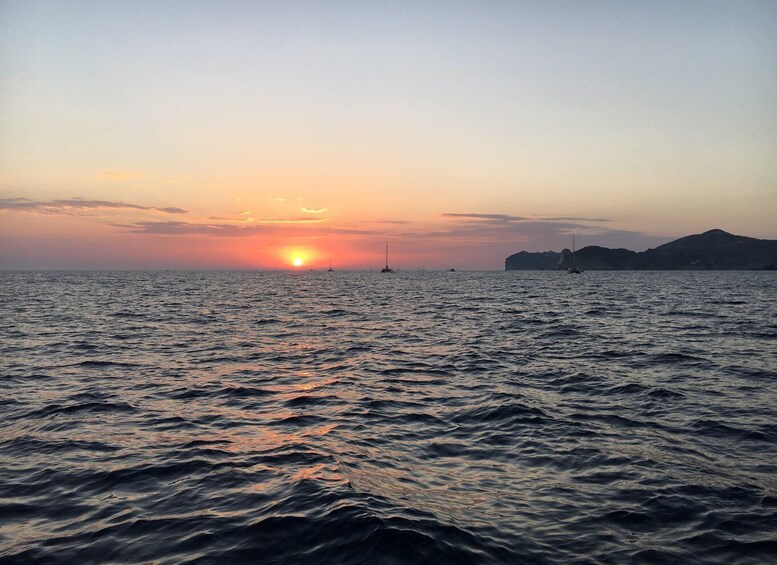 Picture 5 for Activity Fira: Private Sunset Cruise with BBQ, Drinks and Hot Springs