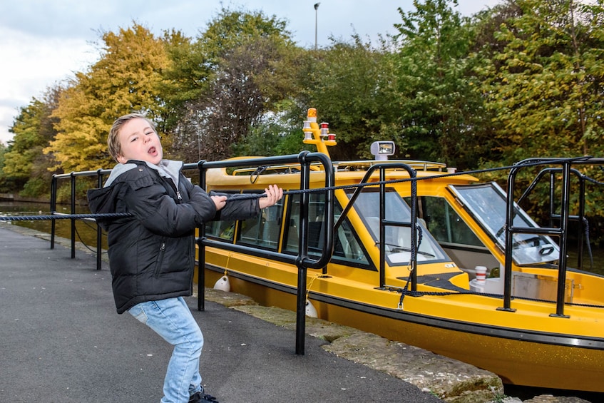Show item 4 of 4. Child getting ready for the Water Taxi Ride to Old Trafford