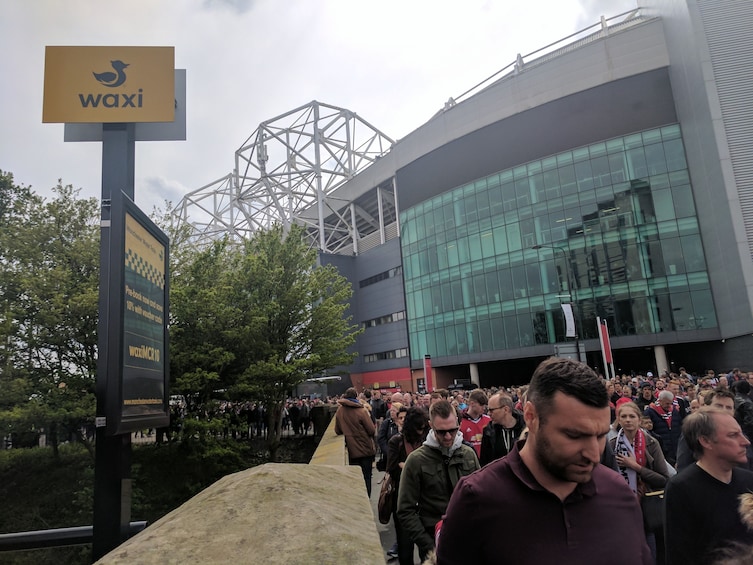 Show item 3 of 4. Line for the Water Taxi Ride to Old Trafford