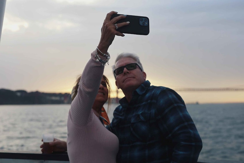 Picture 9 for Activity Lisbon: Sunset Boat Tour with Music and Drinks
