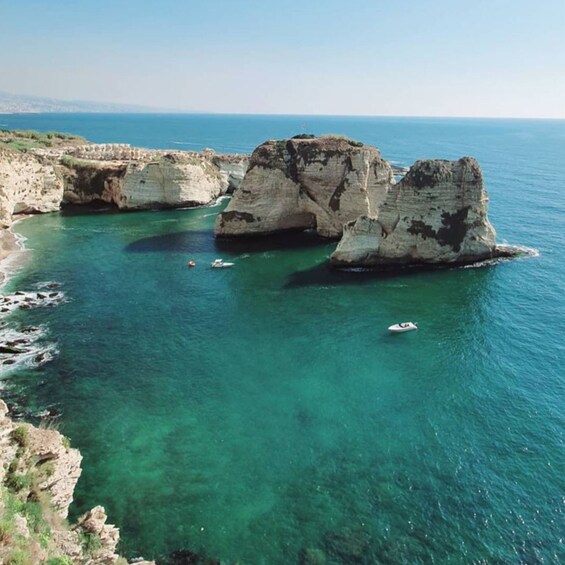 Picture 4 for Activity Beirut: Pigeon Rocks Sunset Boat Trip with Drink and Snacks