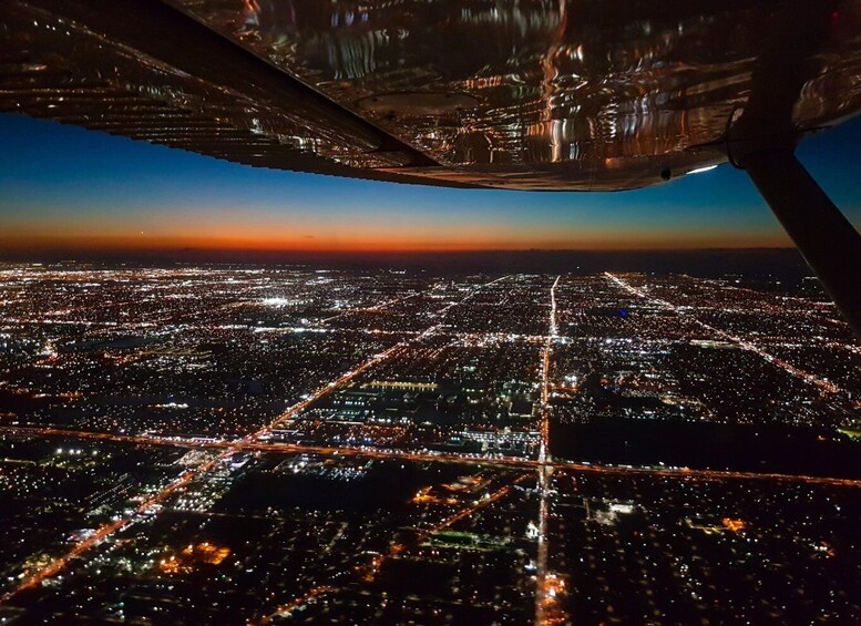Picture 2 for Activity Miami Beach: City Lights Airplane Tour with Free Champagne