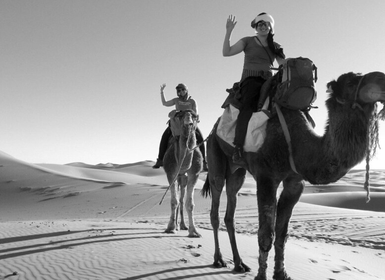 Overnight in Camp with Camel Ride, meals & sandboarding