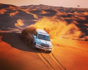 Qatar: Sunset Desert Safari with Camel Ride & Sandboarding
