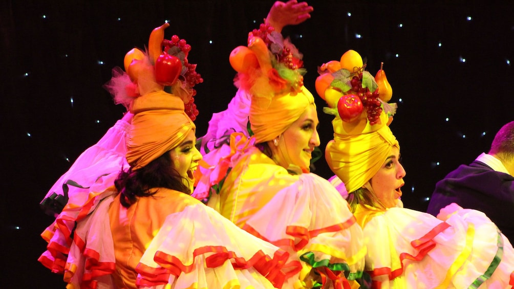 Show item 2 of 4. Dancers in middle of performance at Teatro Martini in Orange County