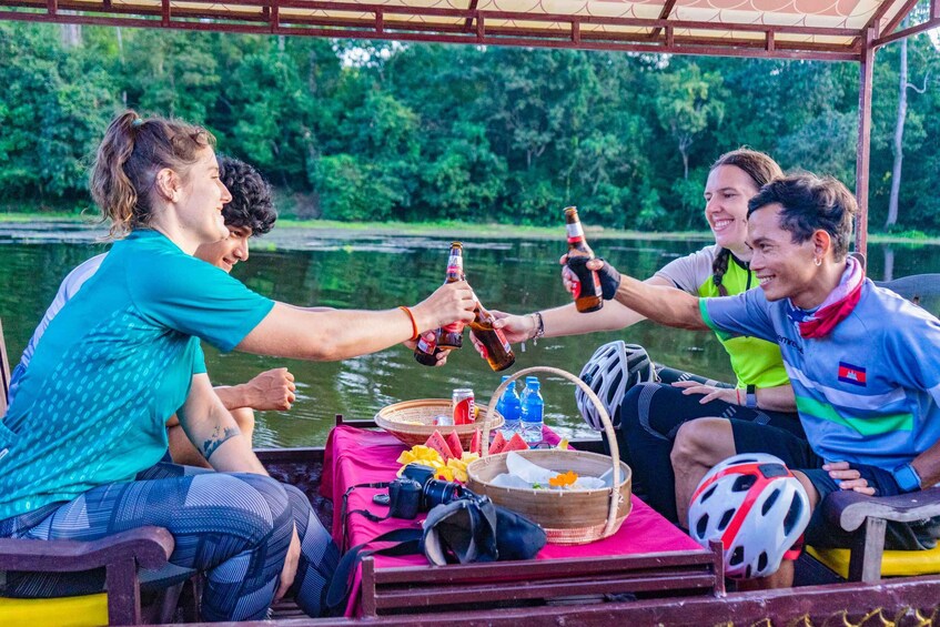 Picture 1 for Activity Siem Reap: Angkor Sunset Bike & Boat Tour w/ Drinks & Snacks