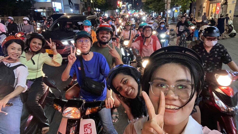 Picture 1 for Activity Ho Chi Minh City: Food Tour by Scooter with Eleven Tastings