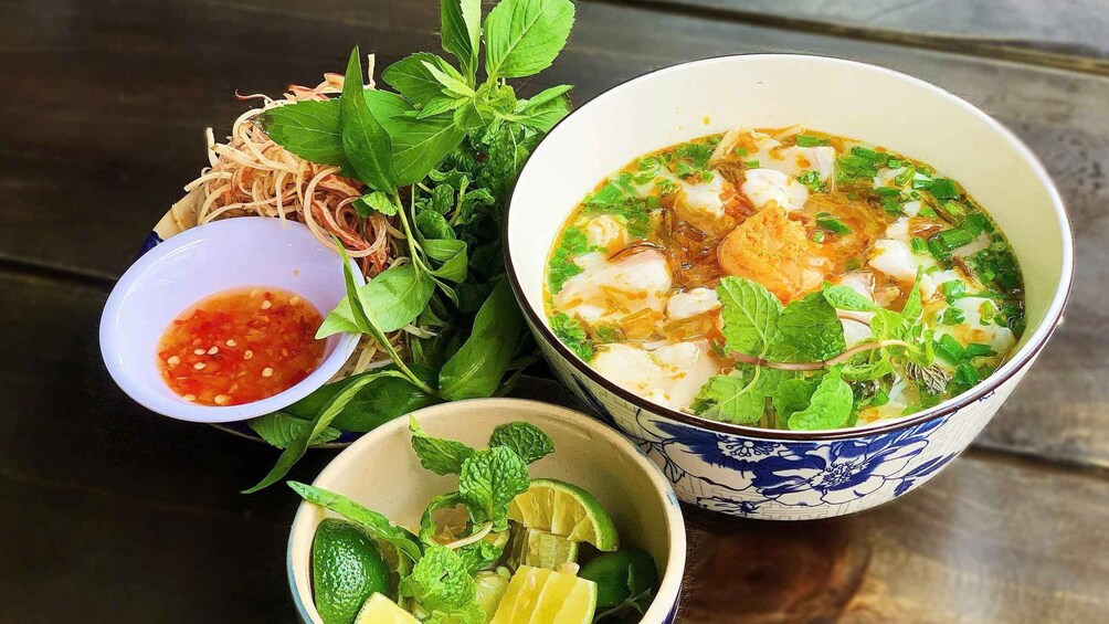 Picture 38 for Activity Ho Chi Minh City: Food Tour by Scooter with Eleven Tastings