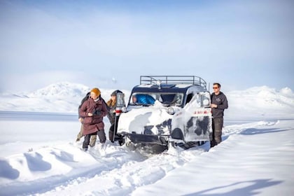 Jotunheimen: Snowcoach Tour with Snowhoeing and Lunch