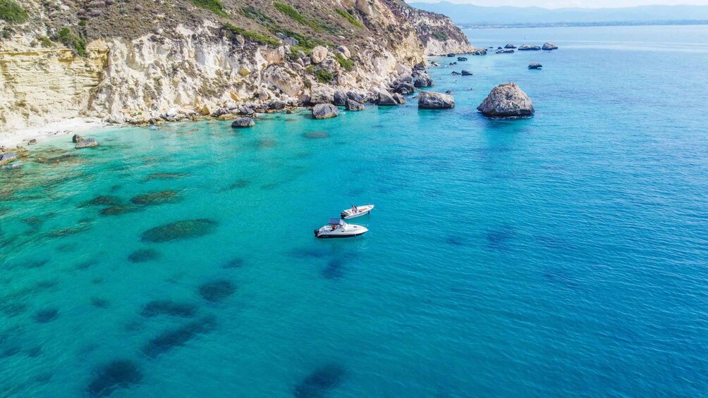 Cagliari Boat Tour to the Natural Pools, Snorkeling and Wine