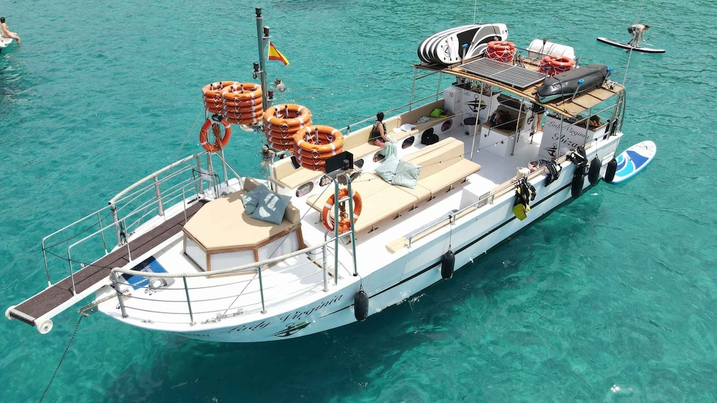 From San Antoni: Cala Bassa, Cala Comte, and Caves Boat Trip