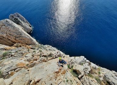 From Nebida: climbing the cliff of Masua