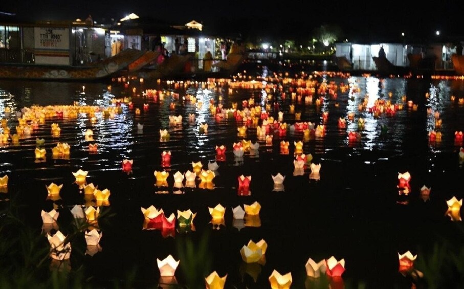 Picture 1 for Activity River Boat Ride by Night with Drop Flower Lantern in Hoi An