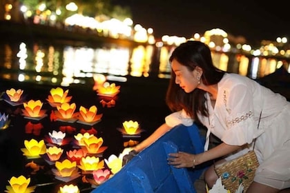 River Boat Ride by Night with Drop Flower Lantern in Hoi An