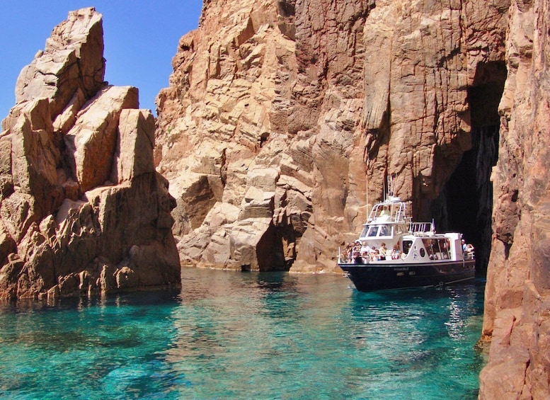 Cargèse: Calanques of Piana on a family boat