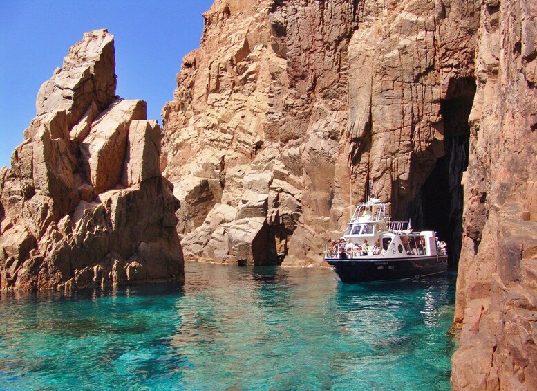 Cargèse: Calanques of Piana on a family boat