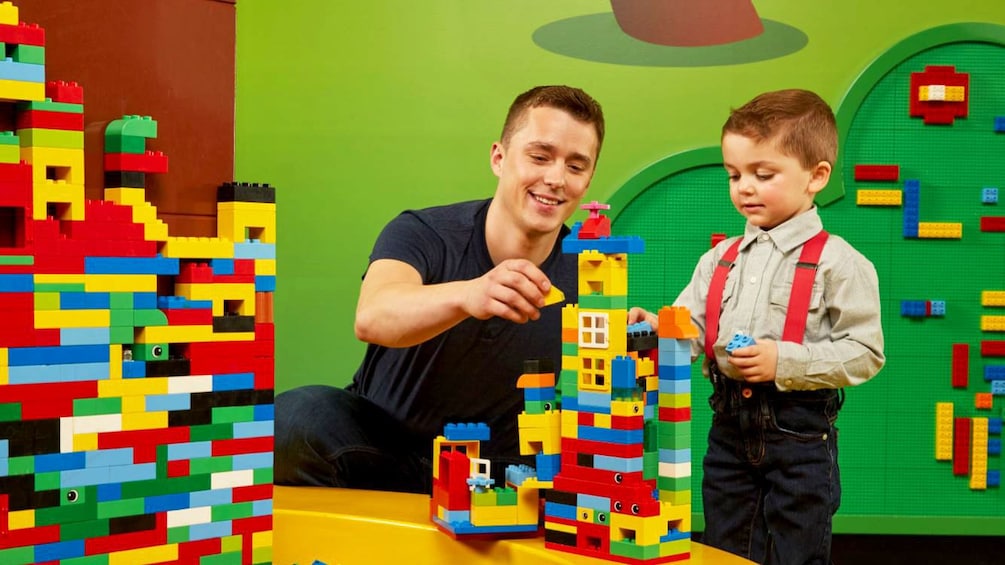 Father and Son playing at Legoland Discovery Center in Melbourne