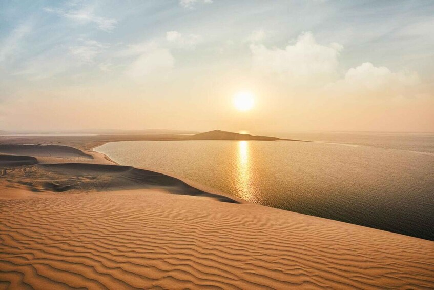 Picture 1 for Activity From Doha: Sunrise or Sunset Safari with Sand Boarding