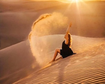 From Doha: Sunrise or Sunset Safari with Sand Boarding