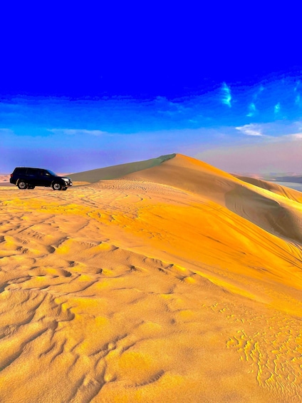 Picture 6 for Activity From Doha: Sunrise or Sunset Safari with Sand Boarding