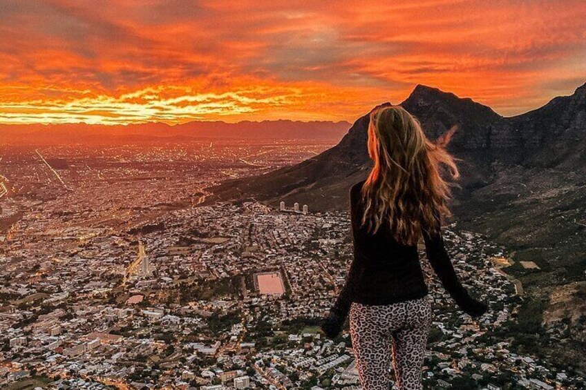 Guest enjoying sunrise experience from the Lions Head summit.