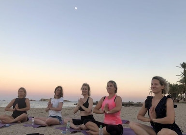 Private Ibiza beach yoga class with friends