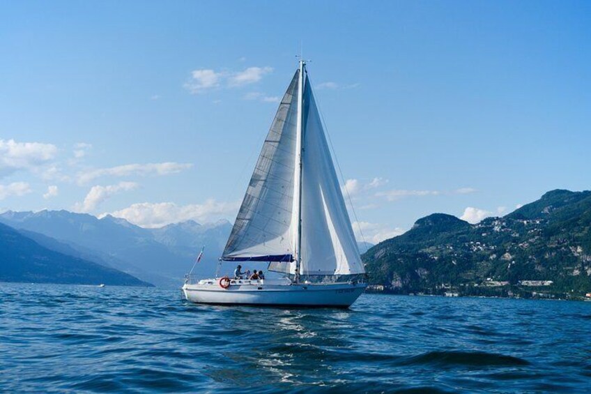 Sunset sailing on lake Como with Private Skipper