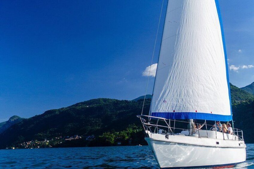 Sunset sailing on lake Como with Private Skipper