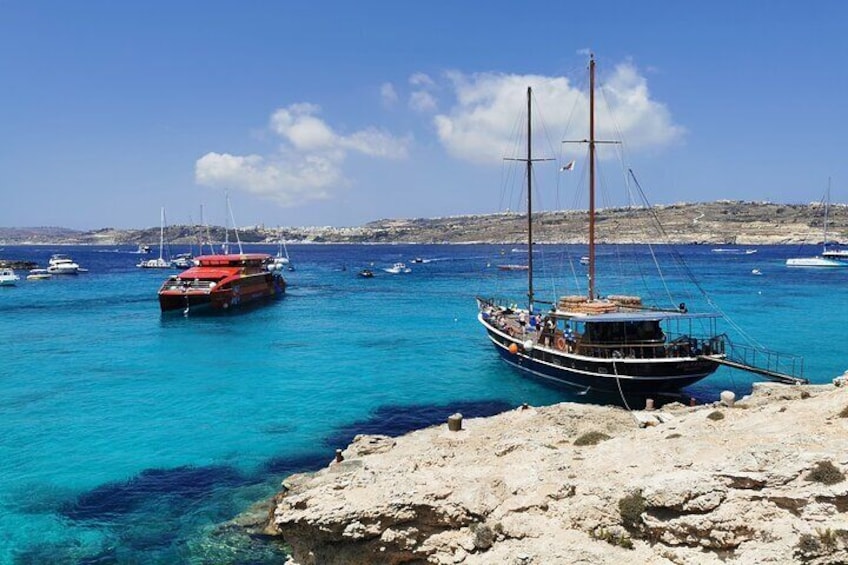 Blue Lagoon in Comino (free time), and Gozo (land tour included)