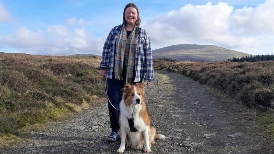 Louise with the Border Collie Max in the uplands