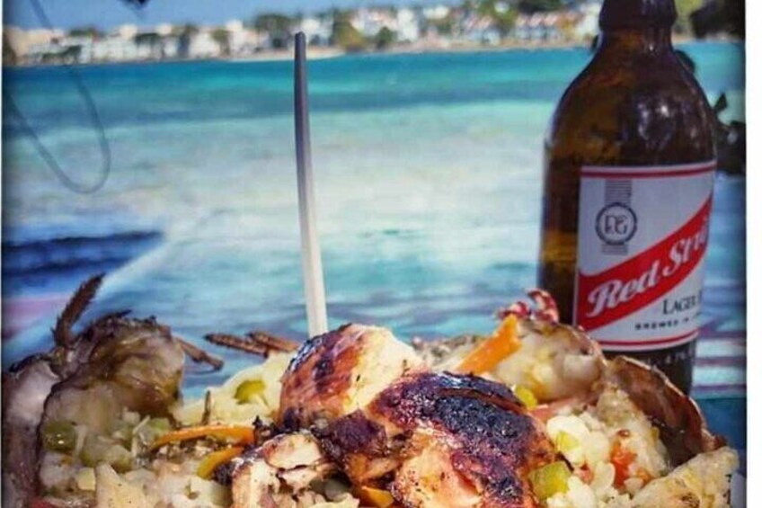 Negril Lobster Lunch on Booby Cay & Snorkeling To a Sunken Cannon