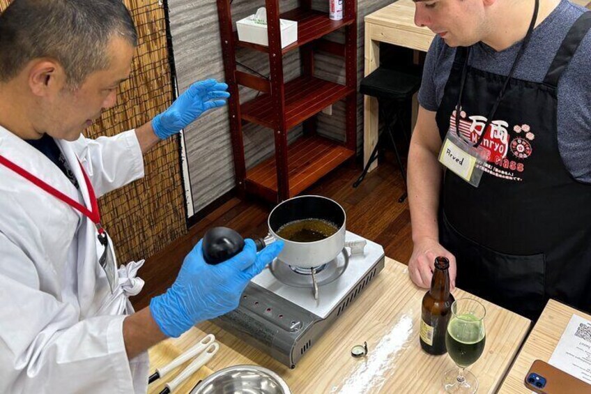 Making udon soup from Dashi broth.