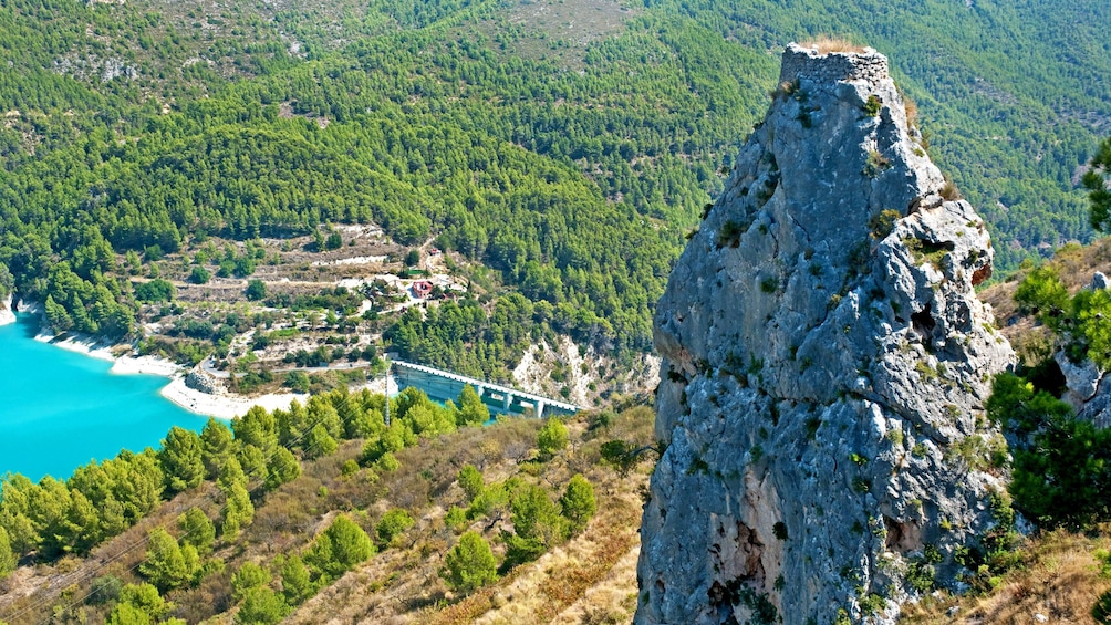 Show item 5 of 5. Rocky lookout overlooking the coast in Guadalest